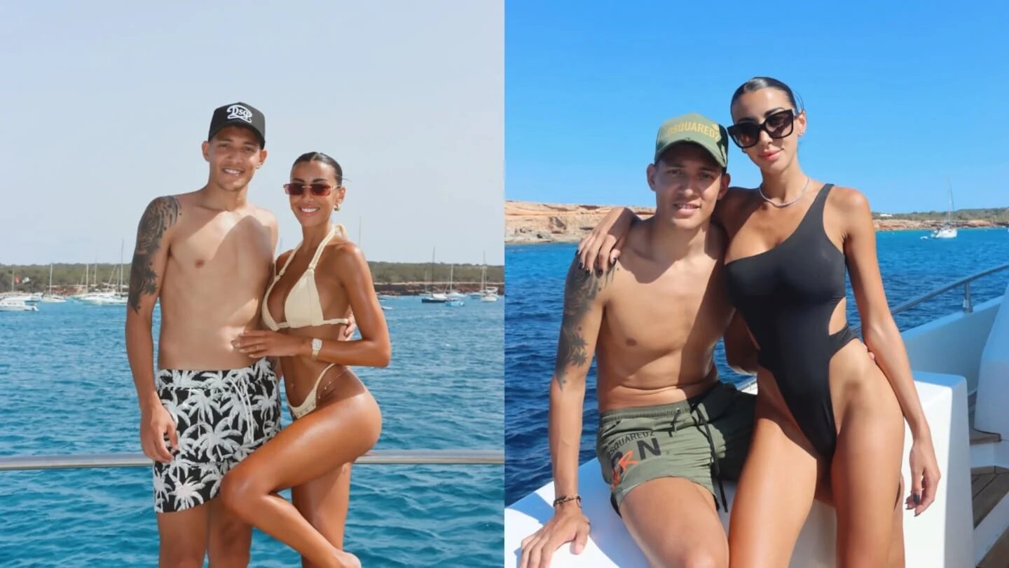 Bárbara Occhiuzzi y Nahuel Molina posando juntos en un yate frente al mar