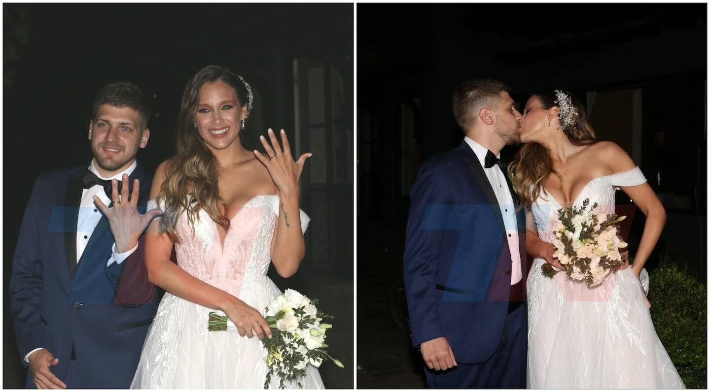 Barbie Vélez y Lucas Rodríguez en su boda, mostrando el anillo de compromiso y compartiendo un beso