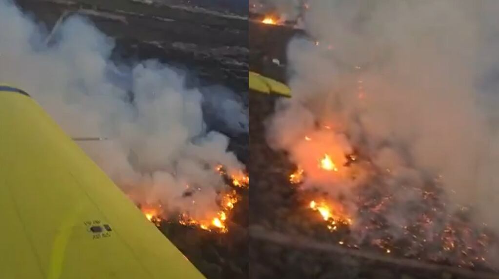Vista aérea de un incendio forestal en Cafayate con llamas y humo