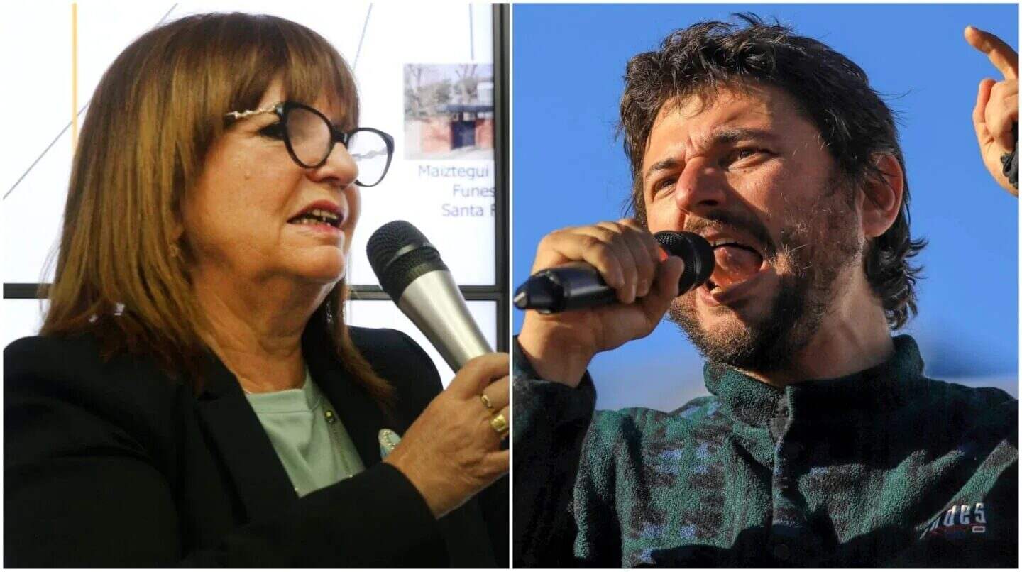 Juan Grabois hablando en un mitin político junto a una mujer en un evento público