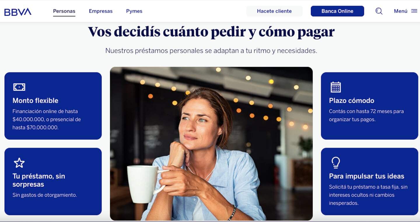 Mujer pensativa en la página de préstamos del Banco BBVA
