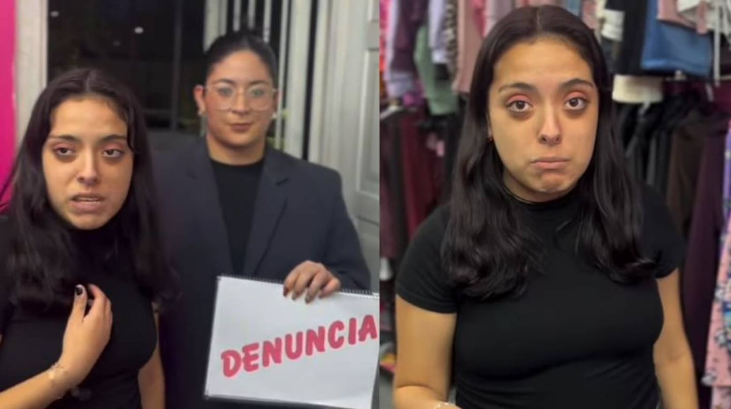 Sandy y otra mujer sosteniendo un cartel que dice 'DENUNCIA' en un entorno de tienda de ropa