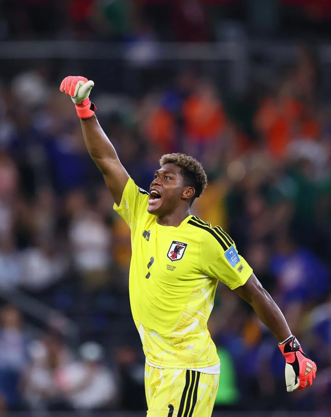 Zion Suzuki, arquero japonés, celebra durante un partido del Mundial 2026